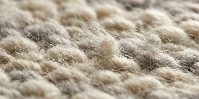 Gaat een wollen vloerkleed pluizen?