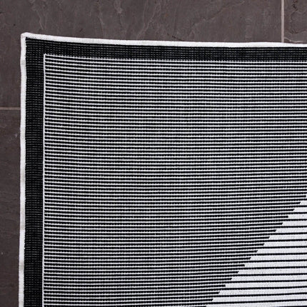 Buitenkleed Kite - Zwart/Wit - dubbelzijdig - EVA Interior - Vloerkledenloods