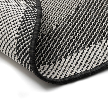 Organisch gevormd buitenkleed Loop Stone Zwart