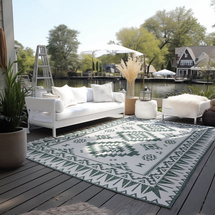 Buitenvloerkleden - Elle Decoration Gemini omkeerbaar binnen- en buitenkleed Dynamic Groen - Vloerkledenloods