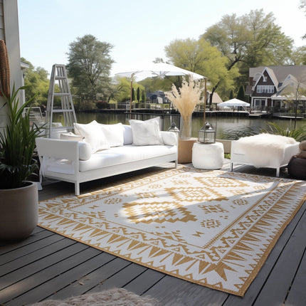 Buitenvloerkleden - Elle Decoration Gemini omkeerbaar binnen- en buitenkleed Dynamic Oker - Vloerkledenloods