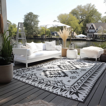 Buitenvloerkleden - Elle Decoration Gemini omkeerbaar binnen- en buitenkleed Dynamic Zwart - Vloerkledenloods