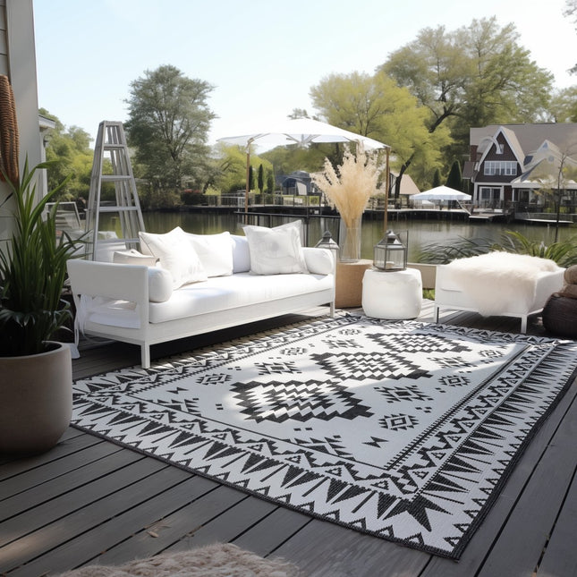 Buitenvloerkleden - Elle Decoration Gemini omkeerbaar binnen- en buitenkleed Dynamic Zwart - Vloerkledenloods