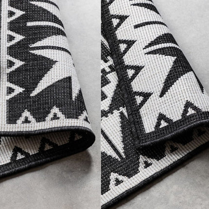 Buitenvloerkleden - Elle Decoration Gemini omkeerbaar binnen- en buitenkleed Dynamic Zwart - Vloerkledenloods