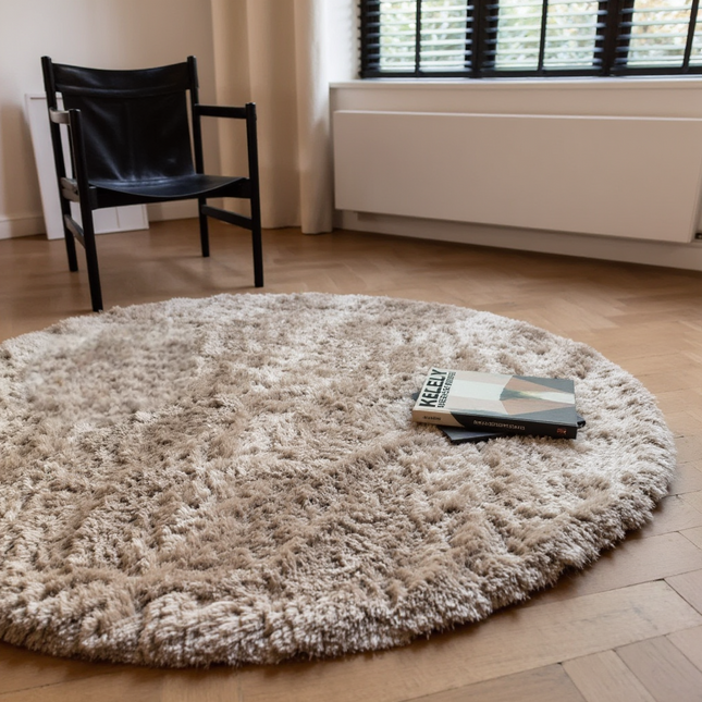 Rond hoogpolig vloerkleed Fender beige