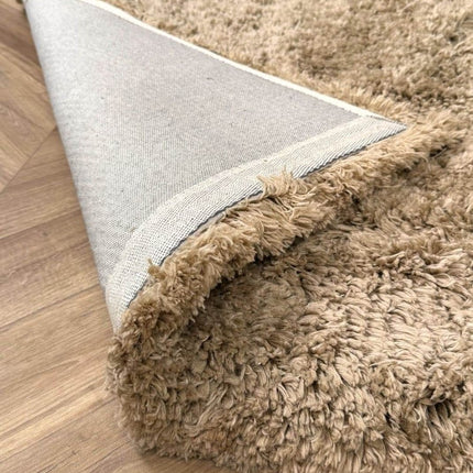 Hoogpolig vloerkleed Pilo taupe polyester Interieur05 - Vloerkledenloods